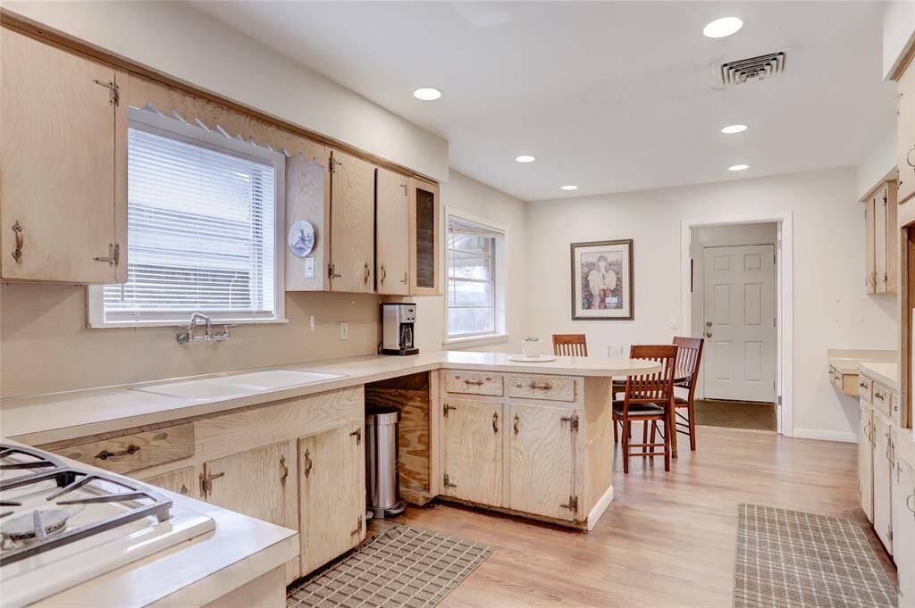 Great potential in the original kitchen offering gas cooktop and lots of storage. Ready for the next buyer’s custom touches.