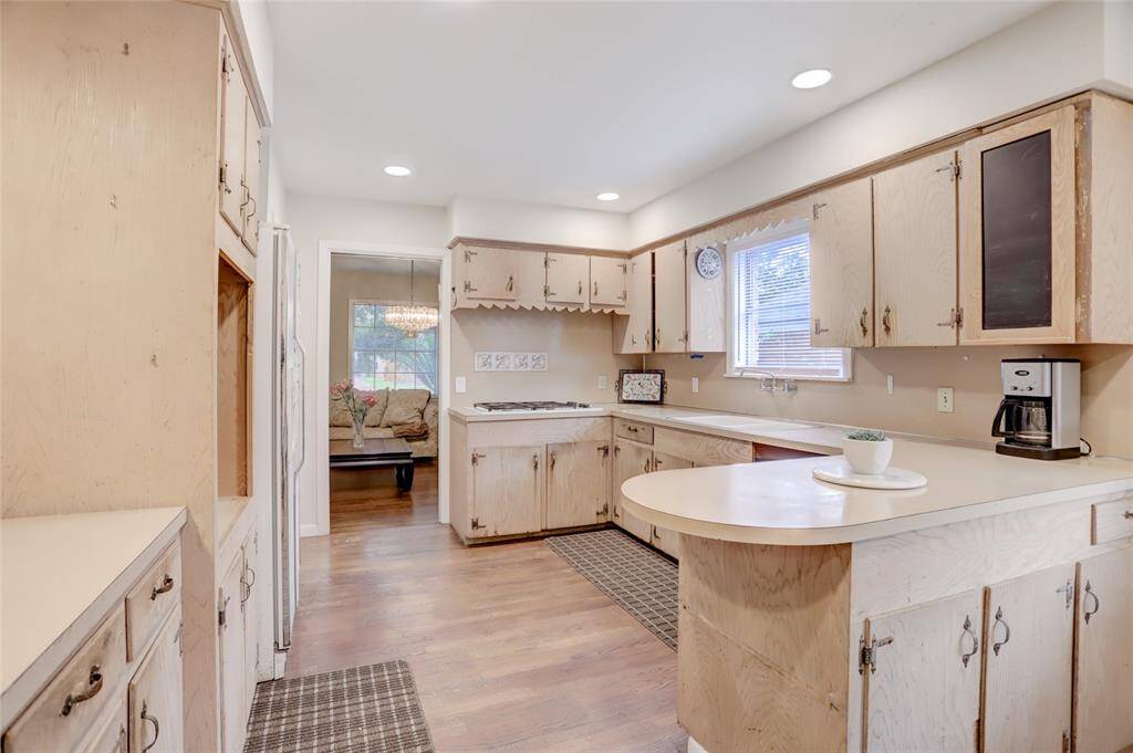 Another view of the kitchen from the breakfast room. Note the recessed lighting.