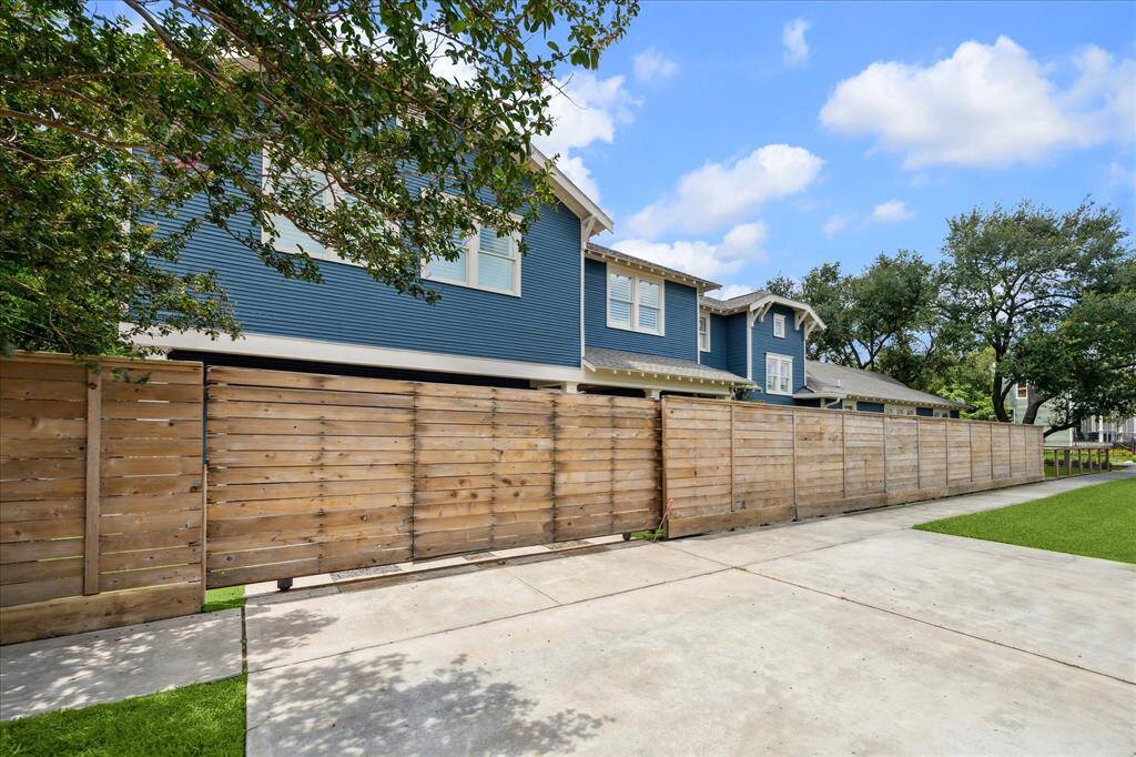 Unlike many homes in the area, this property offers rare convenience with multiple gated parking spaces accessed directly from the street—no alley required. The spacious driveway easily accommodates guests, extra vehicles, or recreational gear behind a privacy fence.