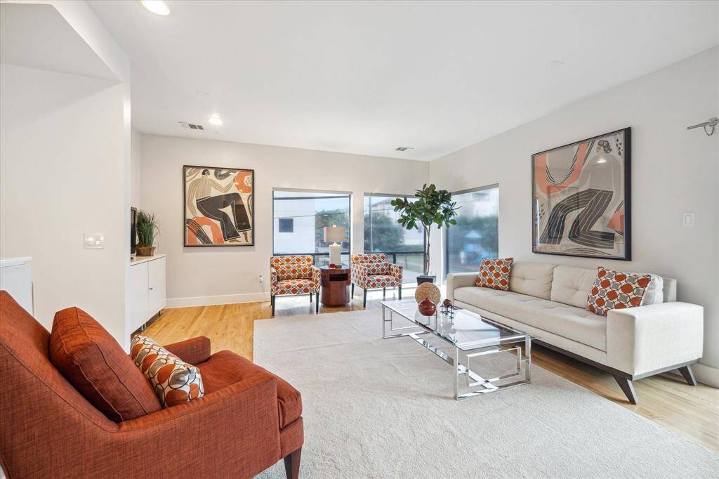 There is a bright and  welcoming entry with tile flooring leading to the downstairs bedroom.