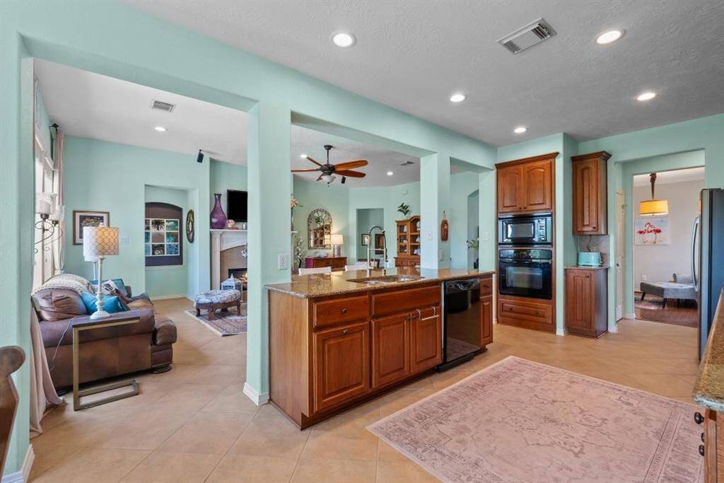 Kitchen is open to the family room with a fantastic island with a breakfast bar