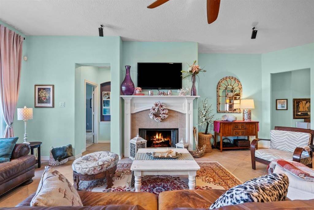 Cozy up on those cool nights with the gas log fireplace