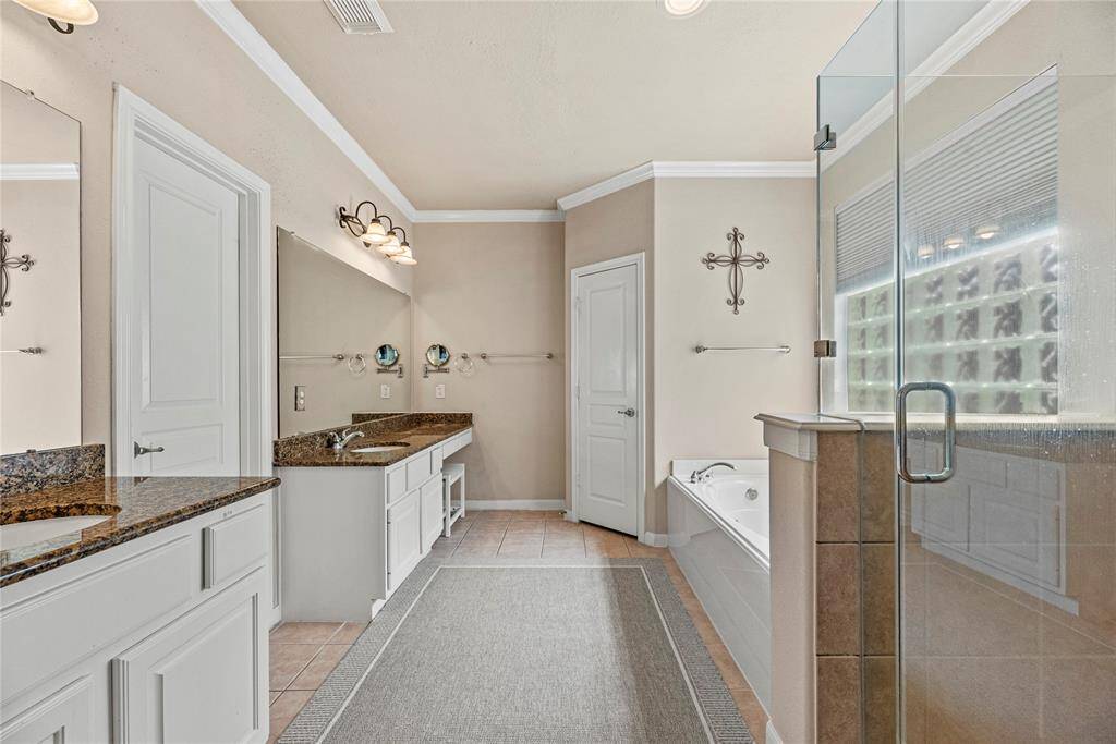 This elegantly designed space combines both functionality and style, transforming your daily routine into a spa-like experience.