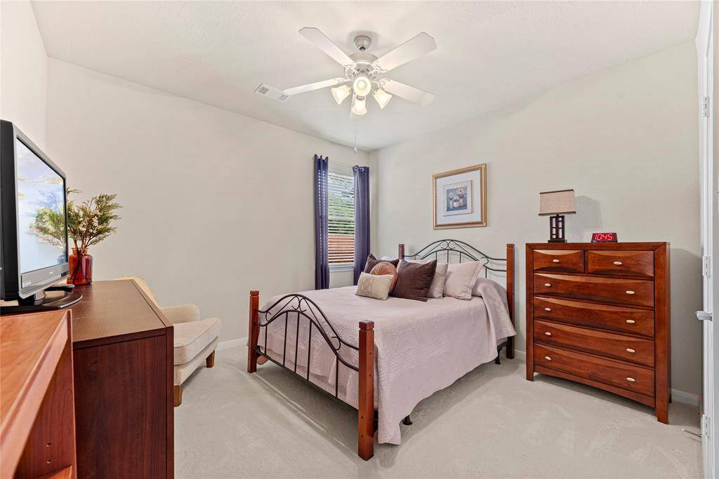 Your second bedroom offers a generous and inviting space that exudes comfort and versatility.