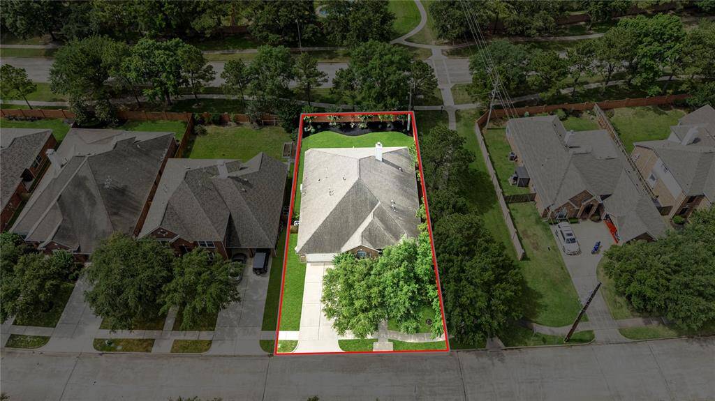 This stunning aerial shot highlights the exceptional location of the home, perfectly positioned for both privacy and convenience.