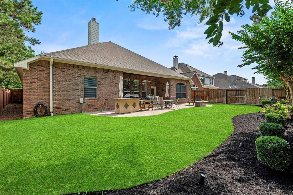 This spacious yard offers endless possibilities for creating cherished memories in the great outdoors.