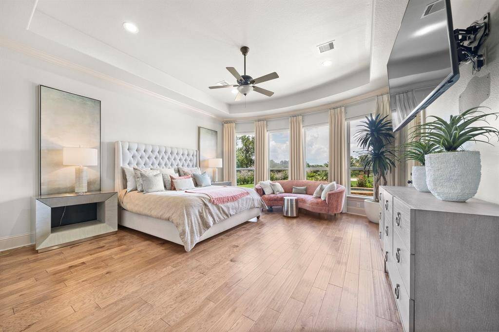 Gorgeous Primary Bedroom with Huge Windows for a personal retreat!
