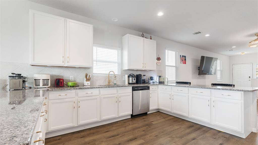 Beautiful kitchen with lots of counter space.