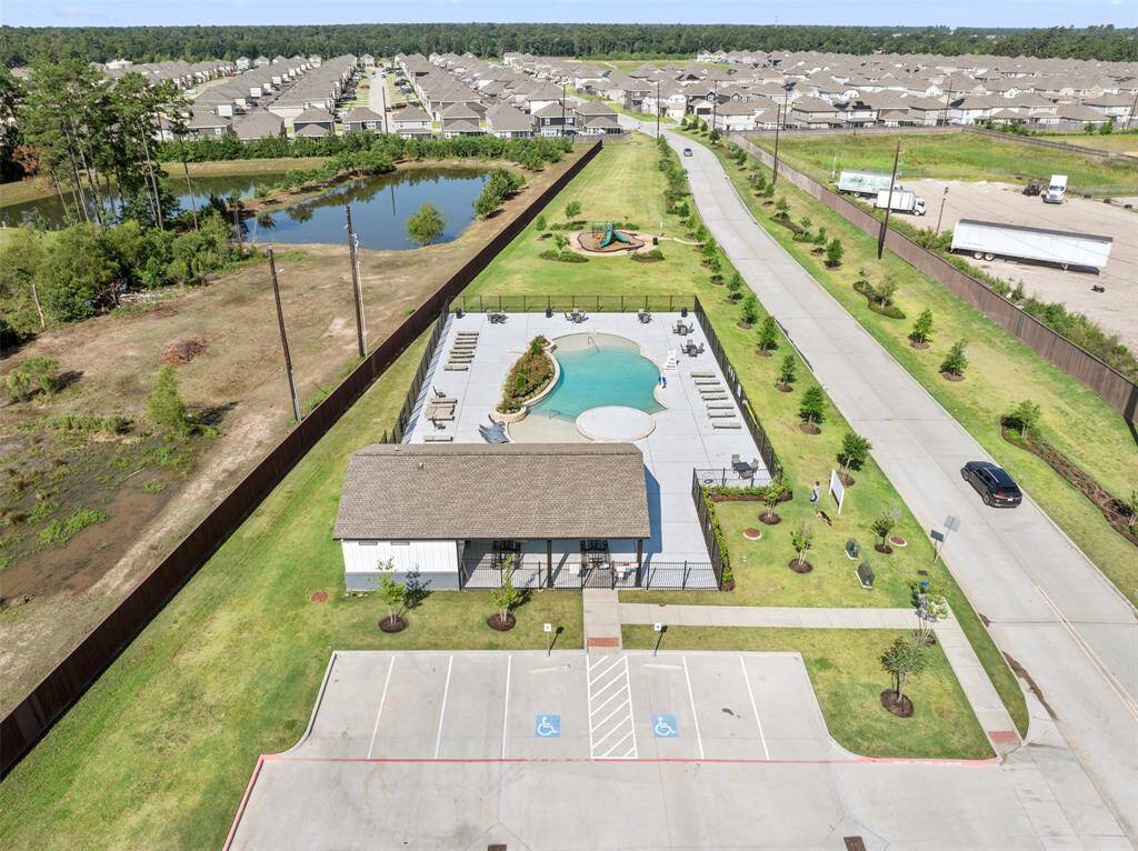 Relax on a hot day at the pool walking distance to the home