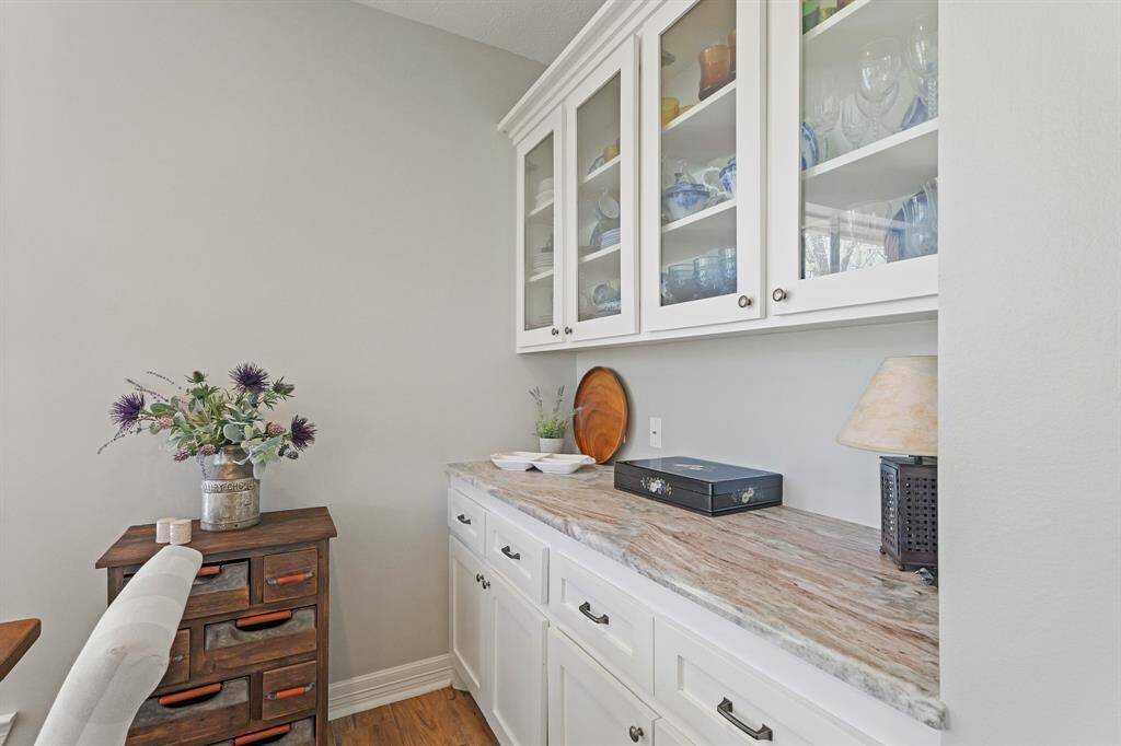 A built-in buffet provides additional storage for less frequently used Kitchen gadgets and dishes. This is also a great place to house the coffee machine, syrups, and teas that help jump start your morning.
