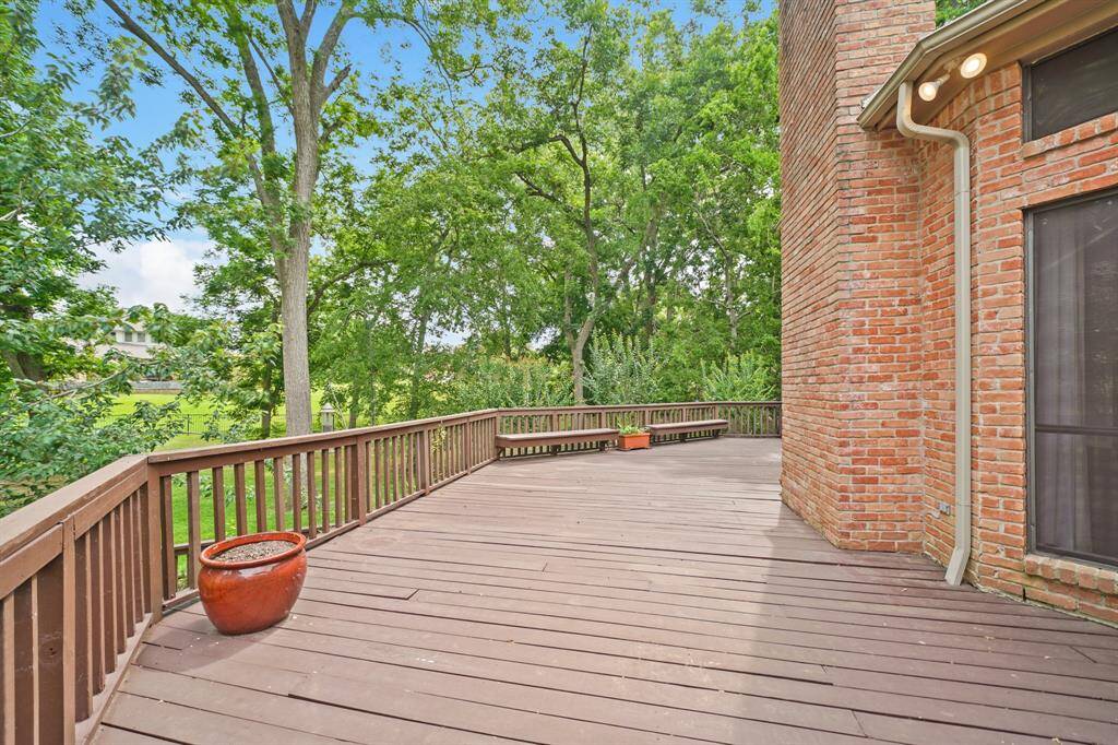 The Deck traverses the entire back of the home, providing different areas to entertain.