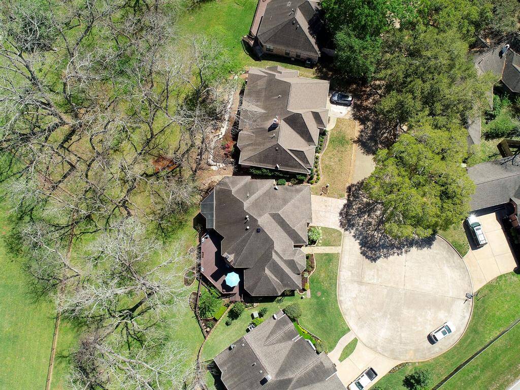 This bird’s eye view highlights the home’s prime location at the end of a quiet cul-de-sac within a gated community.