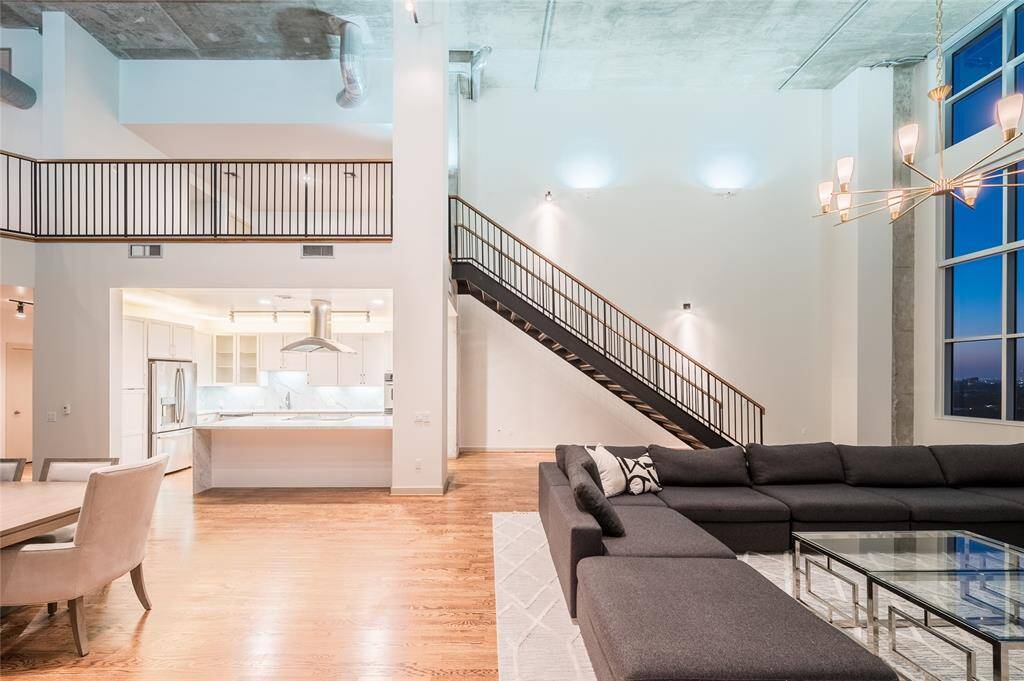 The open-concept layout offers seamless flow between living, dining, and entertaining areas. A rare urban retreat that captures the essence of loft living at its most luxurious.