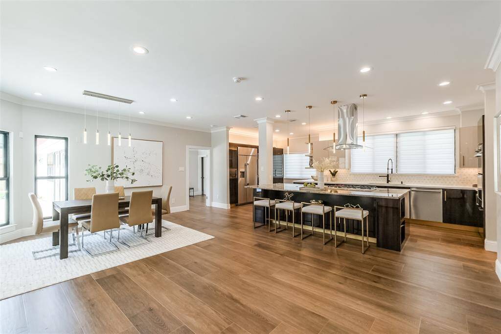 The spacious floorplan allows for large furniture with plenty of room for entertaining. (previously staged)