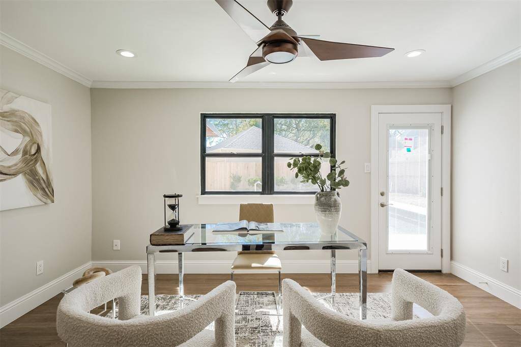 Another view of the flex room/5th bedroom showcasing its direct access to the back yard and pool area. (previously staged)