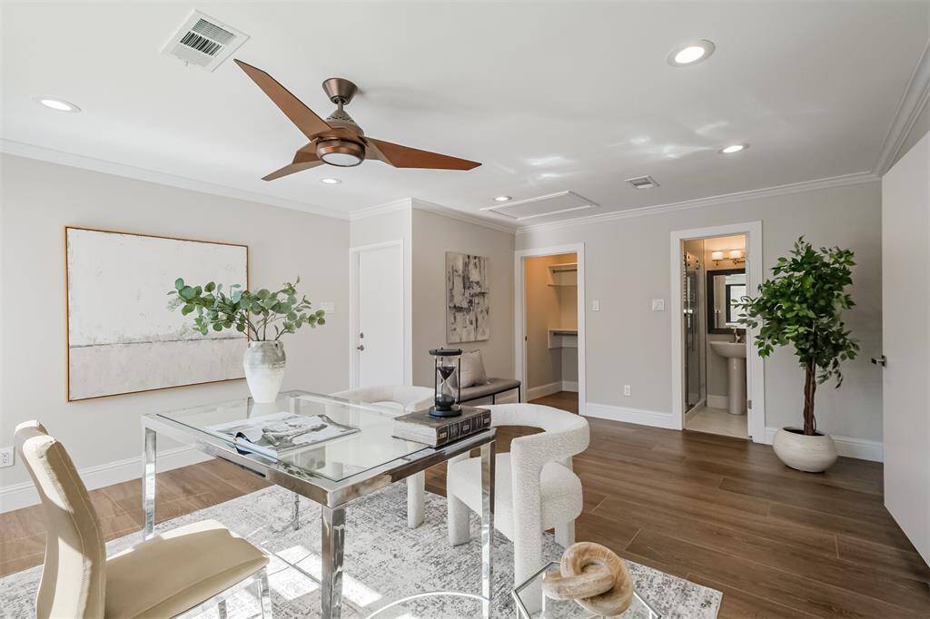 The downstairs flex room with a spacious closet and full bath is perfect for a home office, kids play room or 5th bedroom. This room features direct access to the back yard making it an ideal place to come in from the pool. (previously staged)