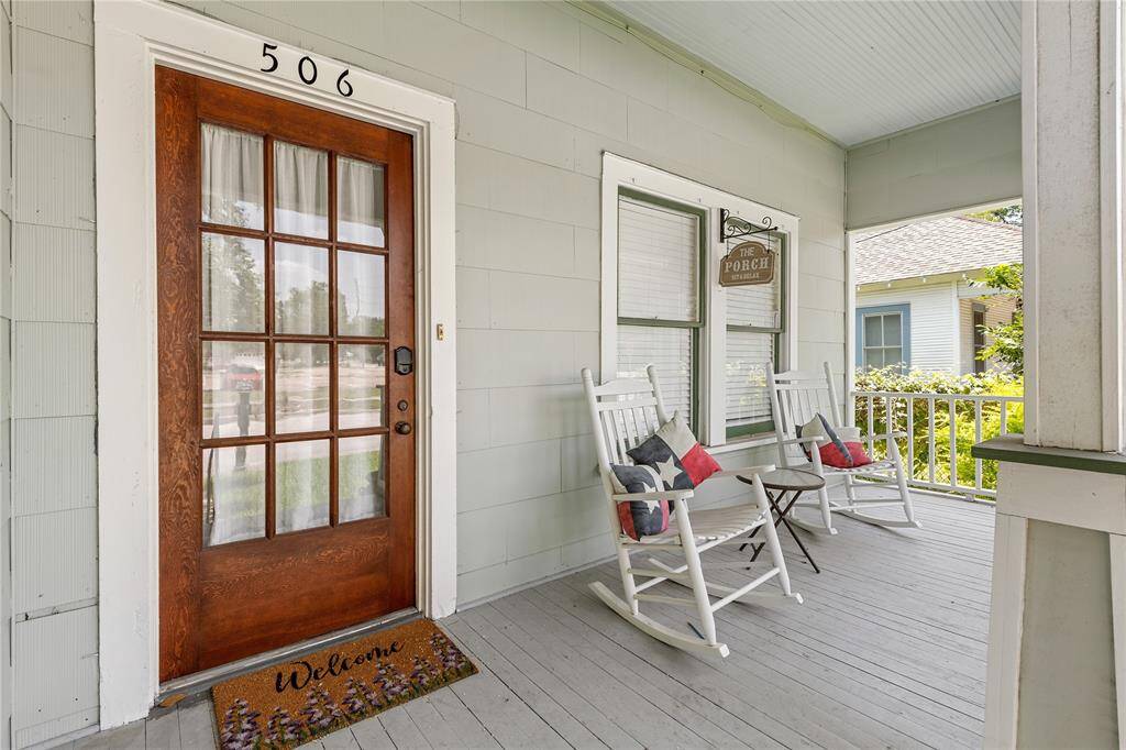 Charming front porch and a cozy ambiance perfect for relaxation.