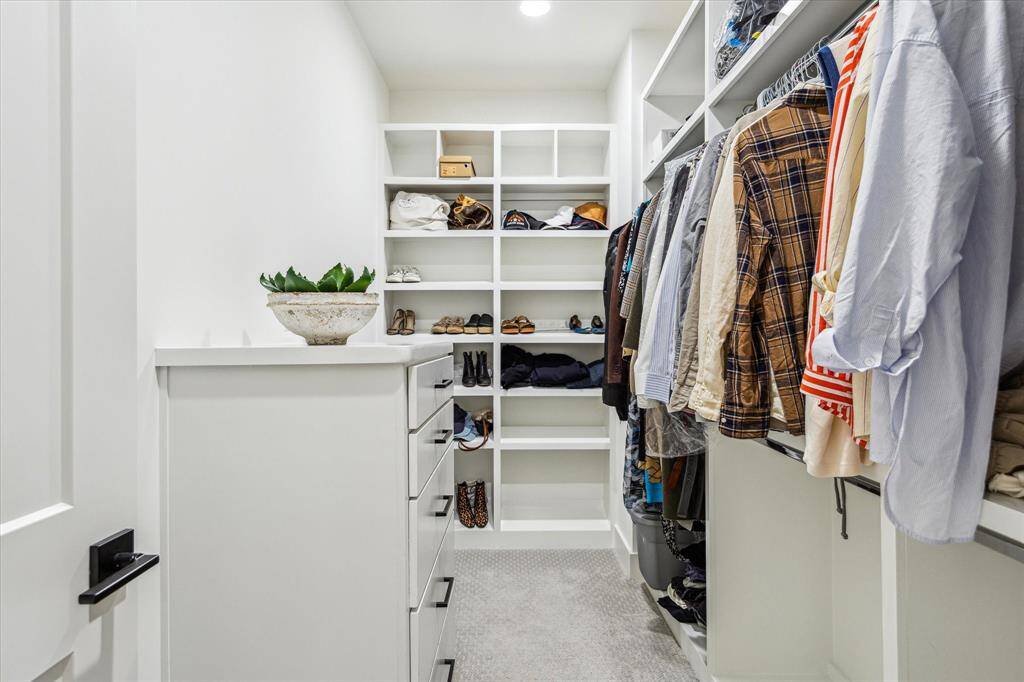 One of two large primary closets.