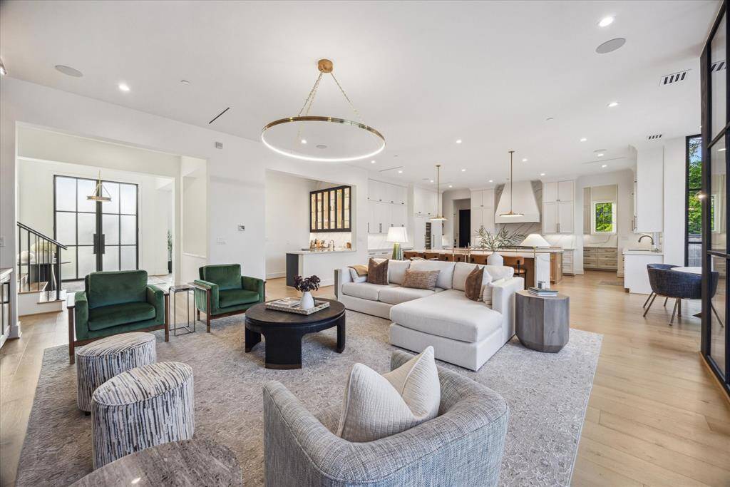 Clean lines and sophisticated finishes complement the space, creating an inviting atmosphere that effortlessly blends comfort with modern elegance."