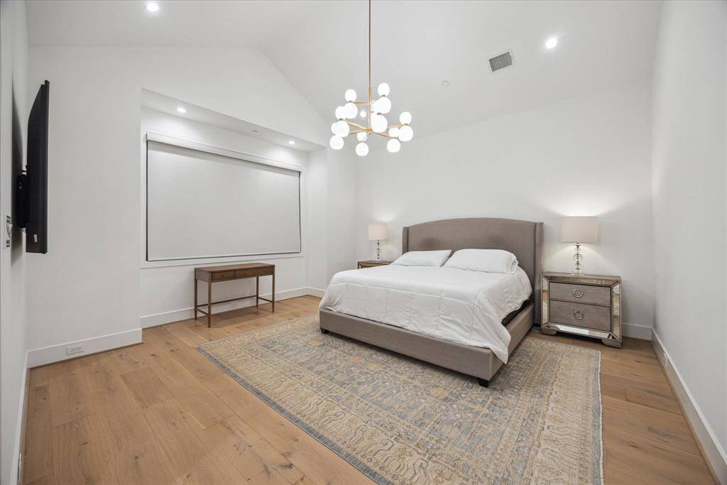 The spacious primary bedroom invites you to unwind and recharge, offering a comfortable and relaxing atmosphere where tranquility meets thoughtful design. Soft textures, soothing tones, and an open layout create the perfect retreat to escape the everyday and find peace.