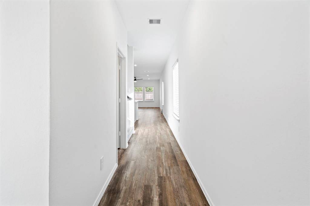 A warm welcome flows through this sunlit entryway