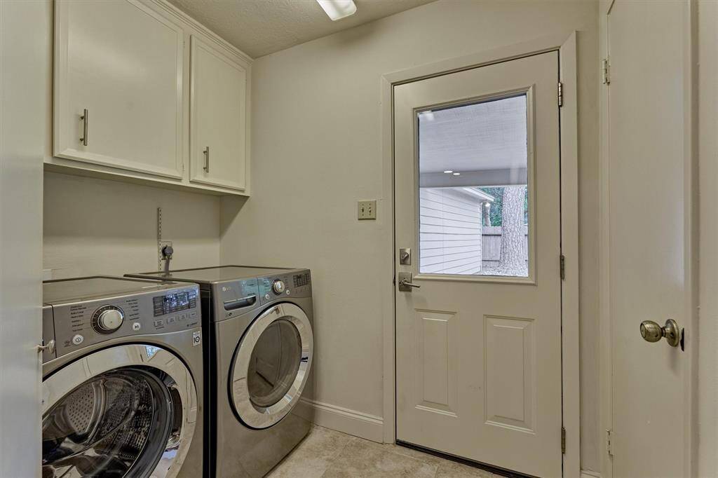Utility room is located with a passthrough to breezeway - provides ease of access for groceries trips!