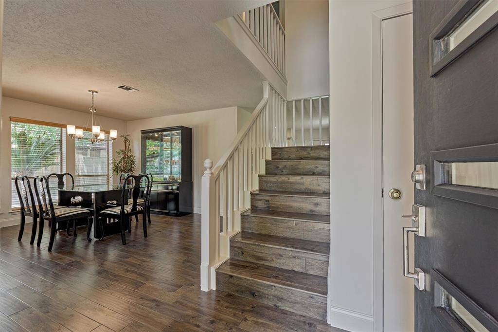 Step inside to a freshly painted interior and continuous wood floors throughout!