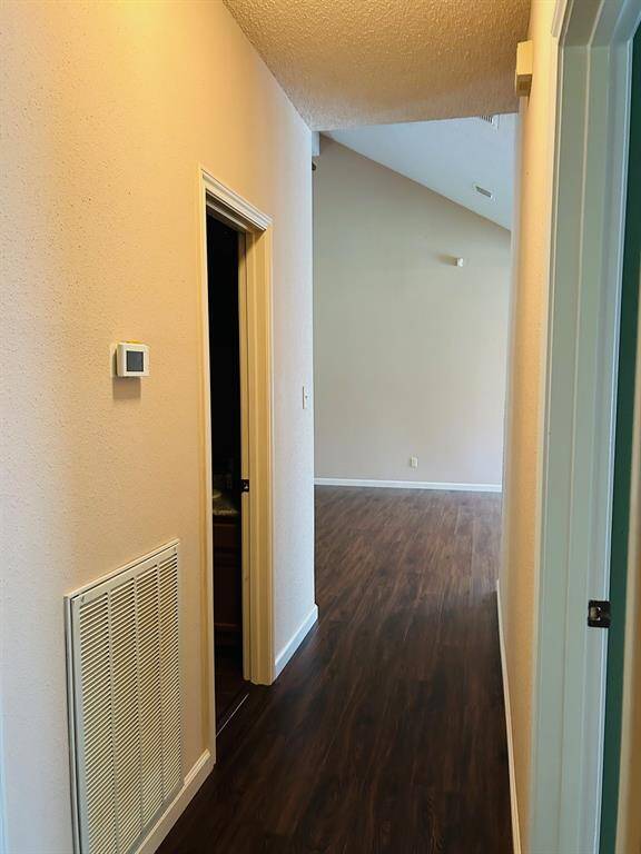 This well-maintained utility room offers functionality and a welcoming atmosphere.