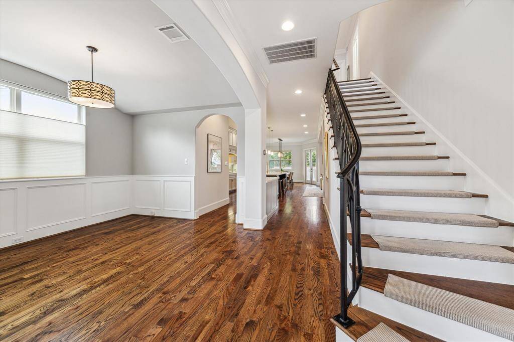Gracious entry open to the dining room and the open plan kitchen and family room beyond.  There is a study just to the left of the entrance.