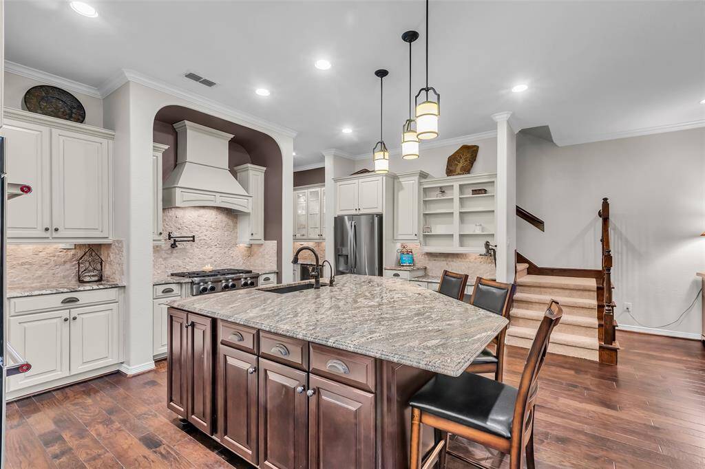 You'll love spending time in the kitchen--a great design, with good flow, in the center of the action.