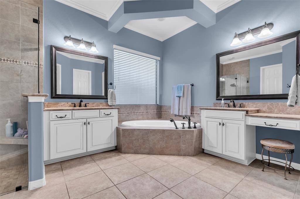 You'll love the separate vanities in the primary bathroom.