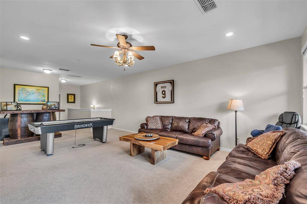 Game room upstairs is huge.  There is room for furniture, TV, game table bar, whatever you enjoy.