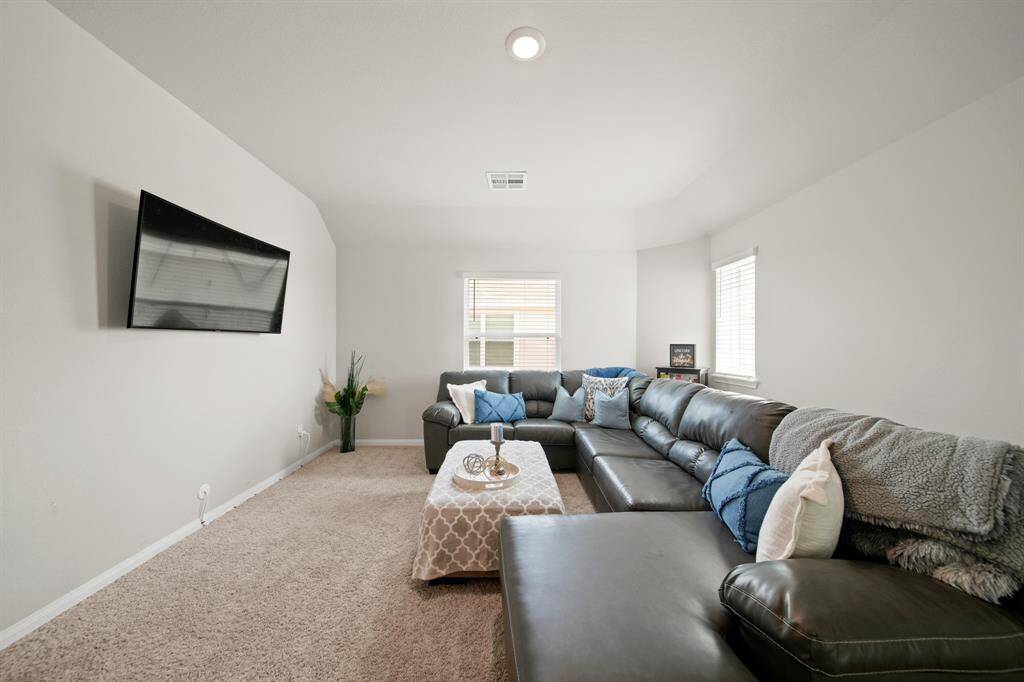 Upstairs is the incredible game room -- this is the perfect space to host neighbors, friends or family.