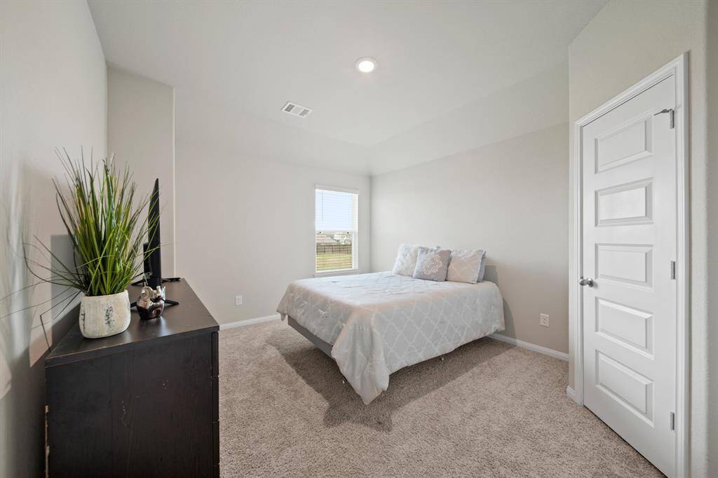 Bedroom #3 has a different layout and features a walk-in closet.