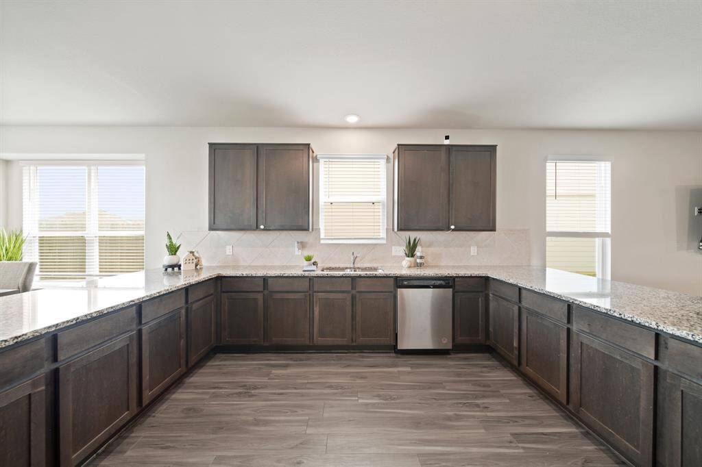You can host all the parties and family events in this incredible kitchen, designed with so much storage and counter space.
