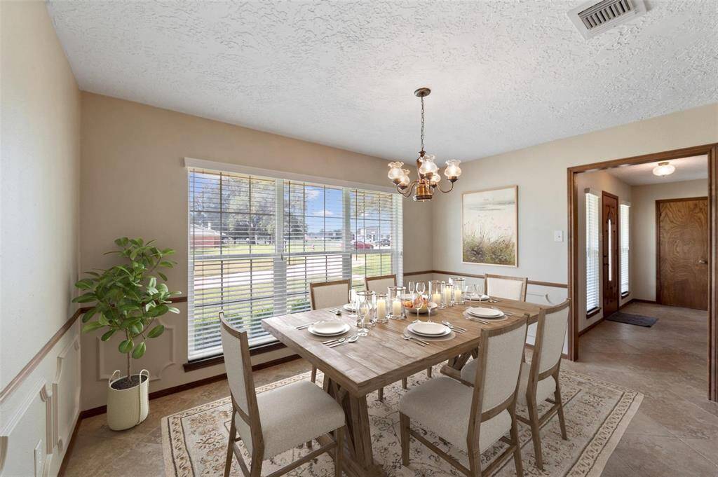 The formal dining area is right off the front door, and provides you with ample natural light coming from the front of the home.