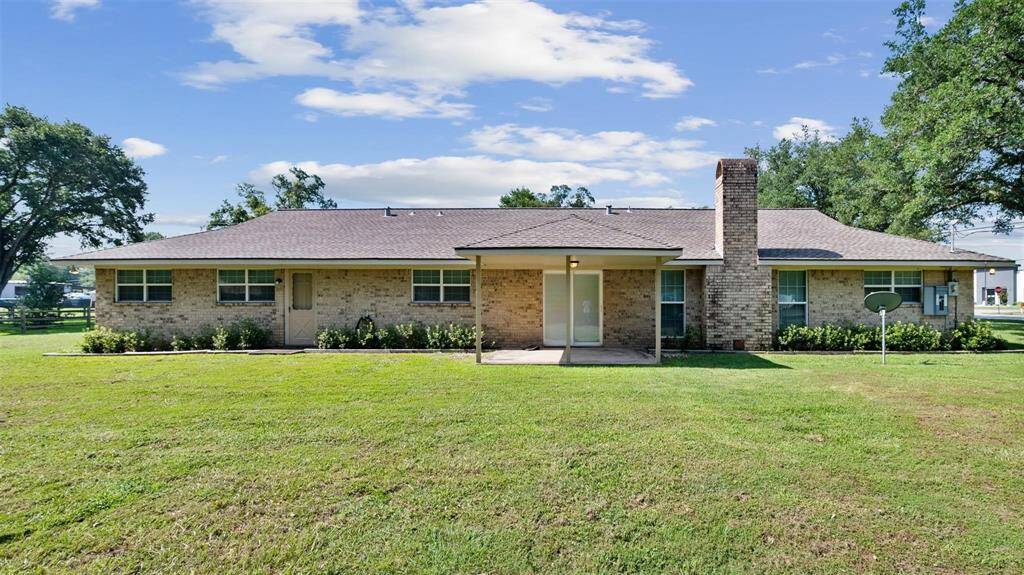 Behind the house, you have a massive backyard to mold into your own.