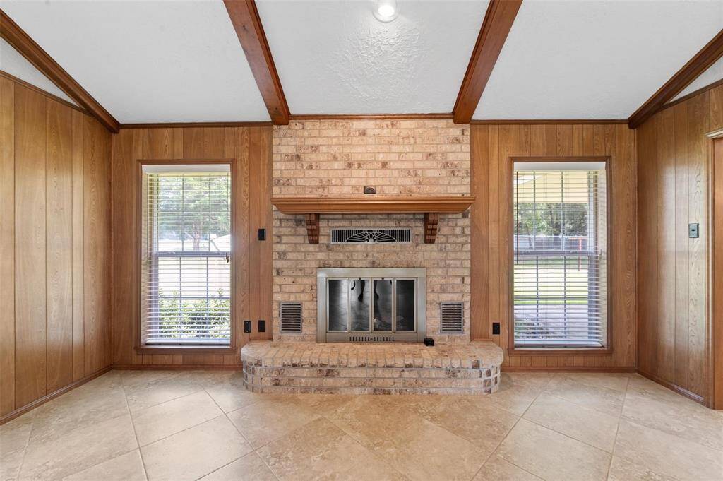 The gas log fireplace is the perfect spot to cozy up next to.