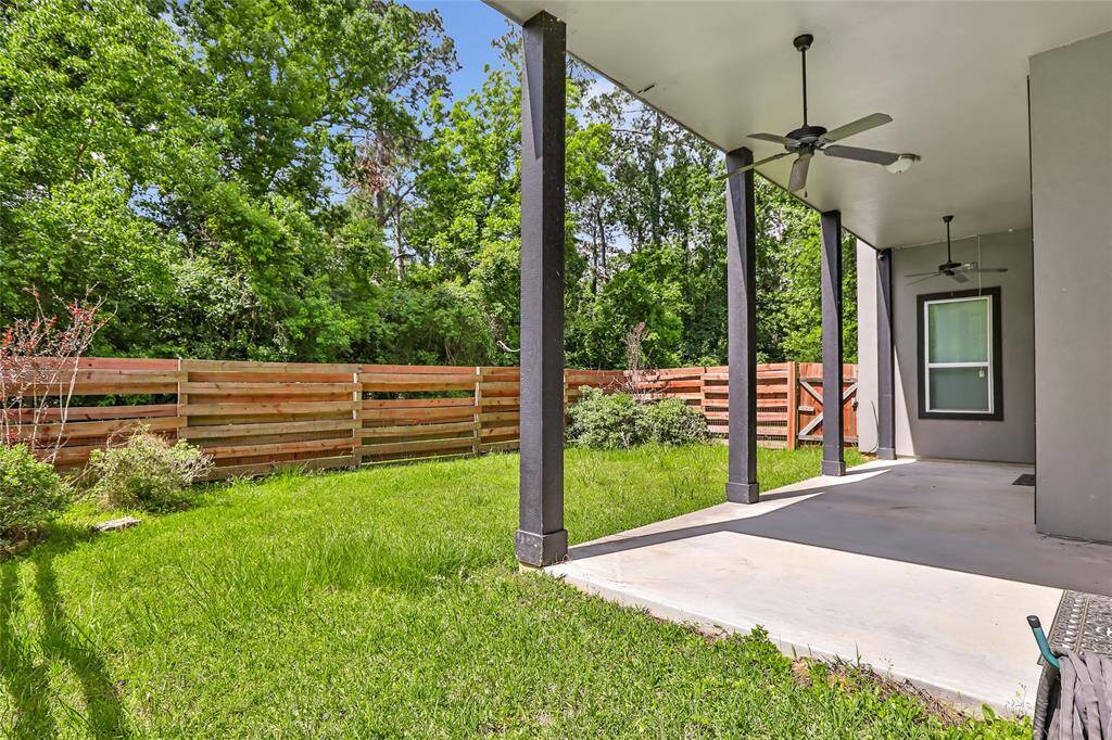 View of fenced portion of back yard.