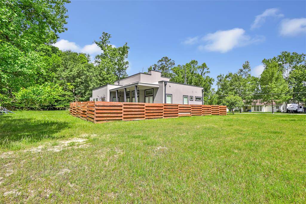 View of back of home. Surrounding land goes with the home