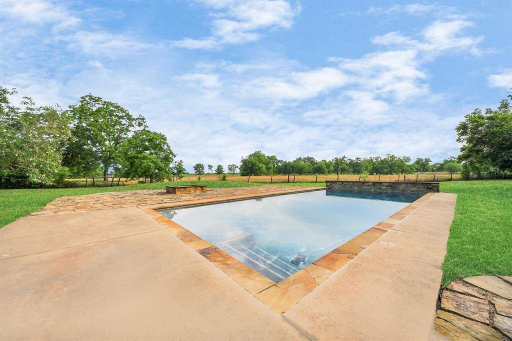 Country living at its finest—endless space, a sparkling pool, and the kind of peace that makes home the only place you want to be.