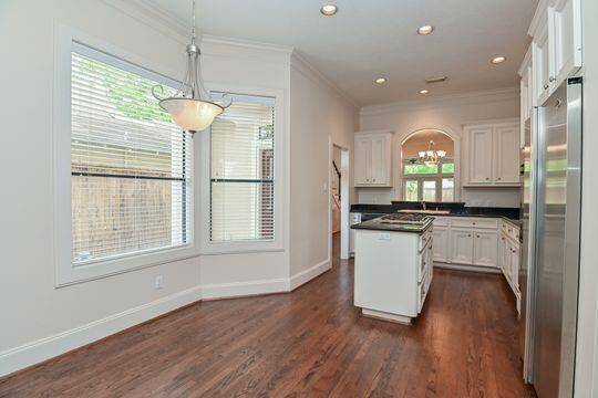 The kitchen features a roomy breakfast area.