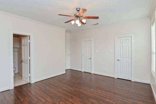 The spacious 2nd bedroom has two closets & it's own en suite bath.