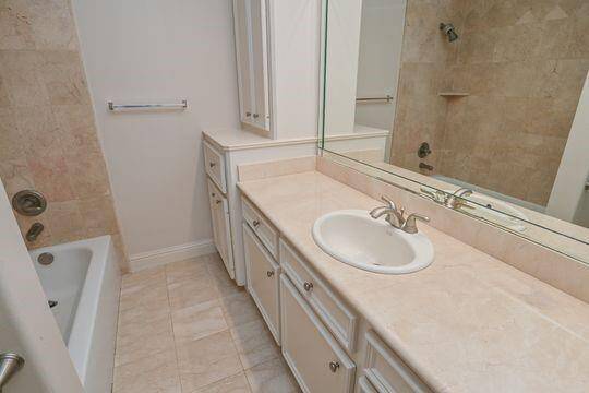 The spacious 3rd floor bath is another delightful spot to soak in a relaxing bath.