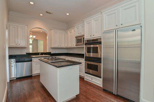 All SS steel appliances & an abundance of cabinet space make the kitchen a chefs dream.