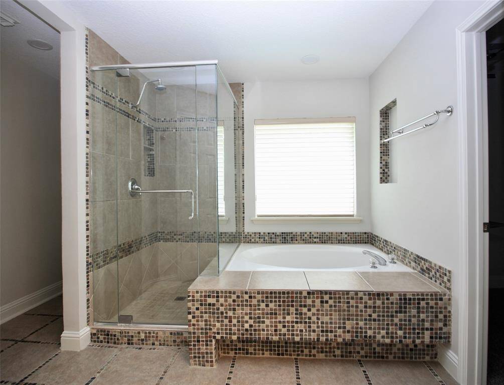 Master Bathroom with Shower and Bathtub.