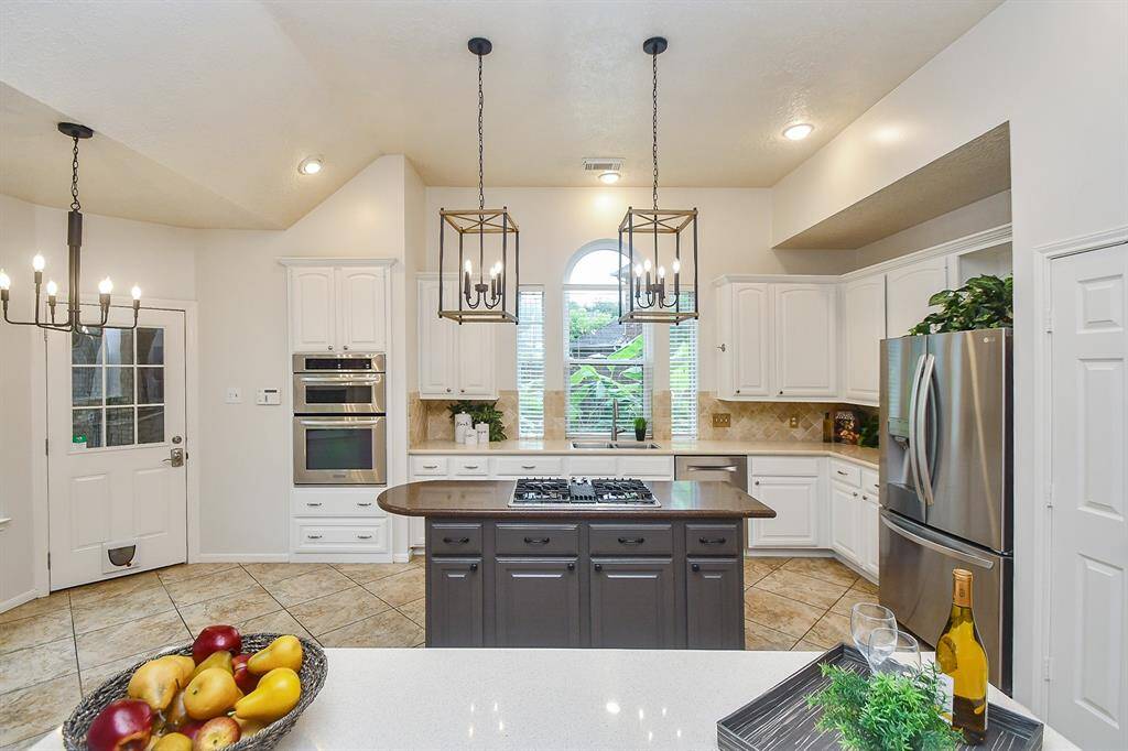 Stainless Steel Appliances plus refrigerator included too!