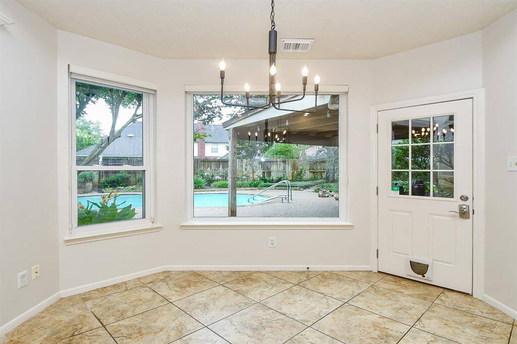 Breakfast Room offers amazing views of the Backyard Paradise!