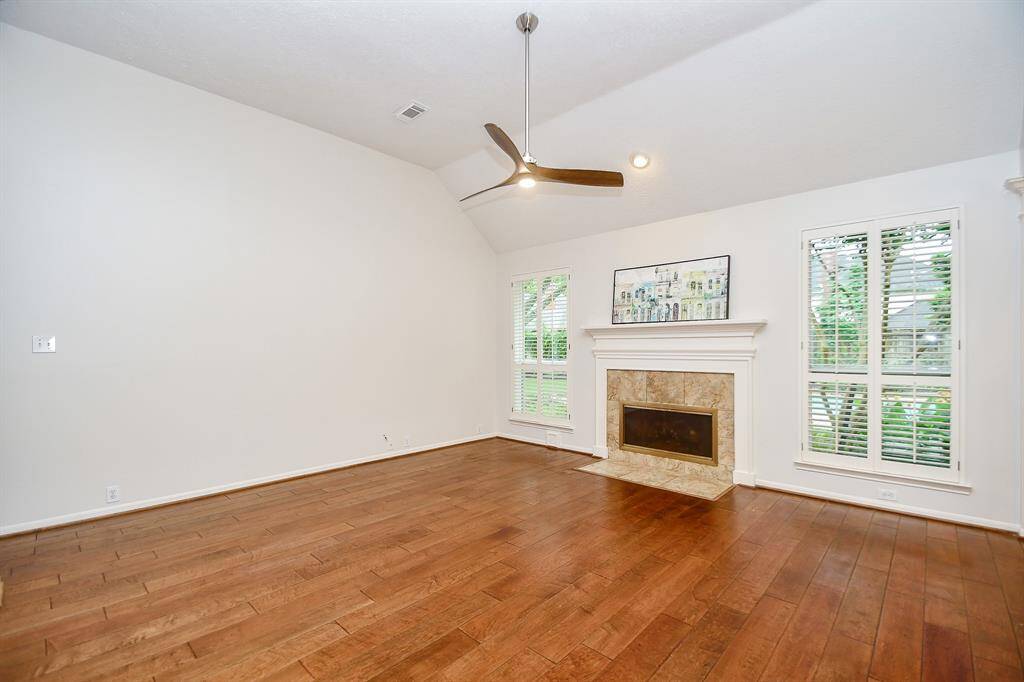 Custom Shutters in this room!    All Windows in the house have been updated with energy efficient windows!
