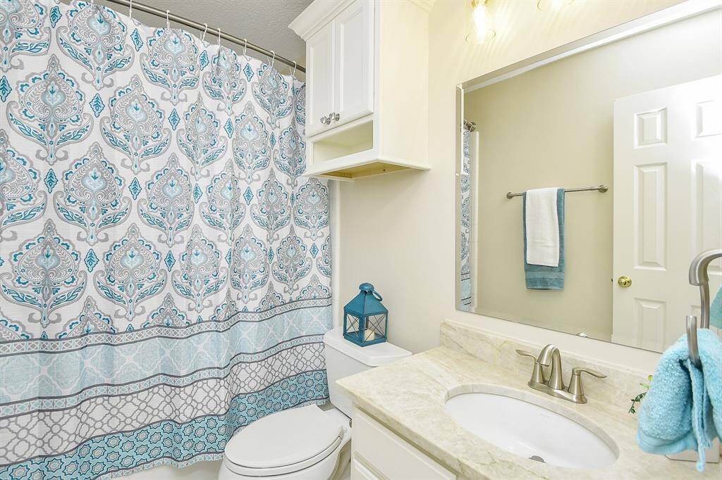 This full Bathroom upstairs is conveniently located off the game room near Bedroom 2.